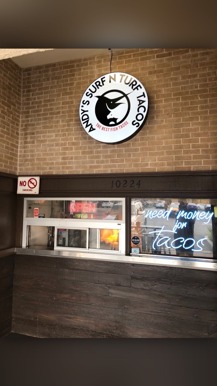 Andy’s actual storefront and marlin-and-bull sign, from its official photo gallery
